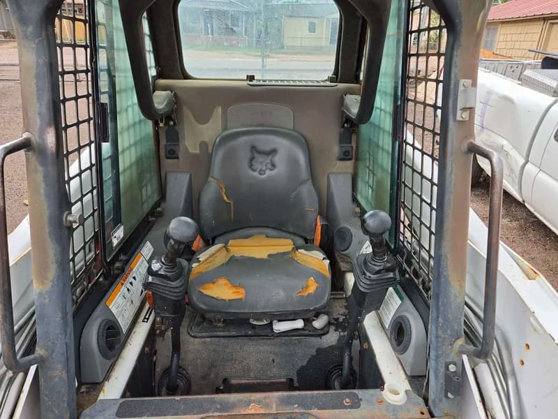 Bobcat S160 Compact Skid Steer Loader w/ Bucket, close-up view