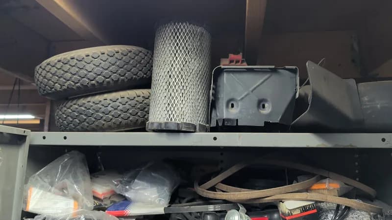 Lawn Equipment Parts & Accessories Lot with Metal Shelf - Cabinet not included, rear view