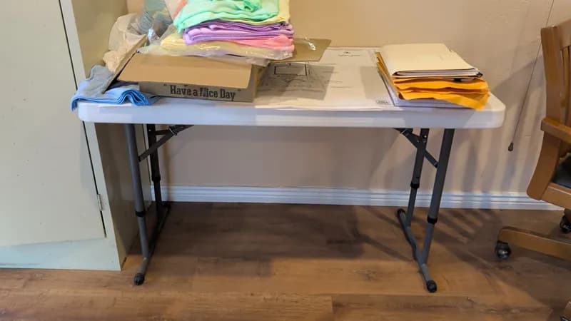 White Plastic Folding Table with Black Metal Legs, primary view