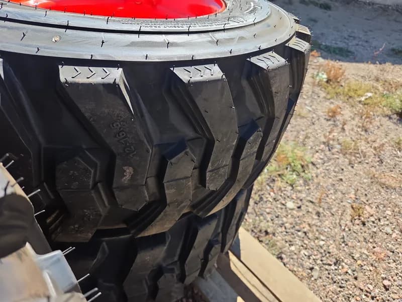 Set of 4 new wheels and tires for Bobcat/Kubota 12-16.5 N.H.S. SKS-1, detail view